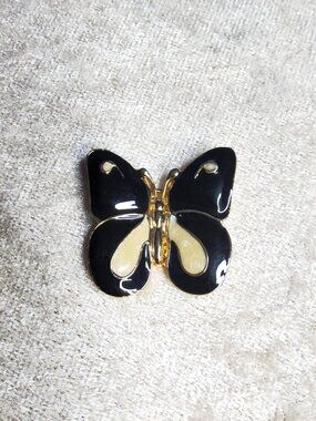 vintage gold tone, black and white enamel butterfly brooch